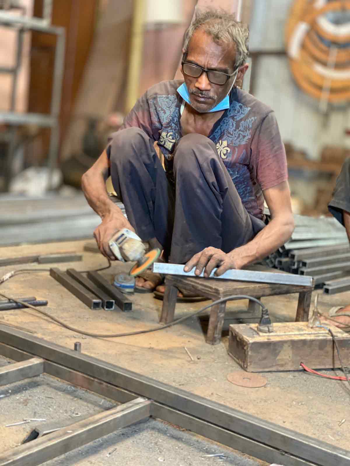 workers working on decorative lights