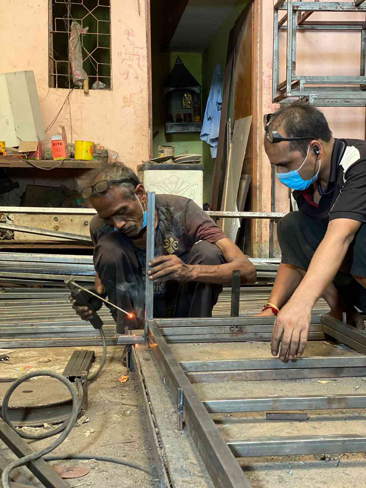 workers working on decorative lights